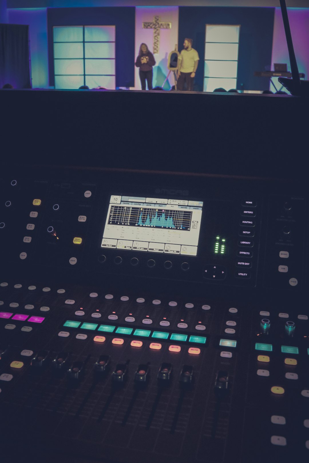 Broadcast control room with multiple video monitors and a live production switcher
